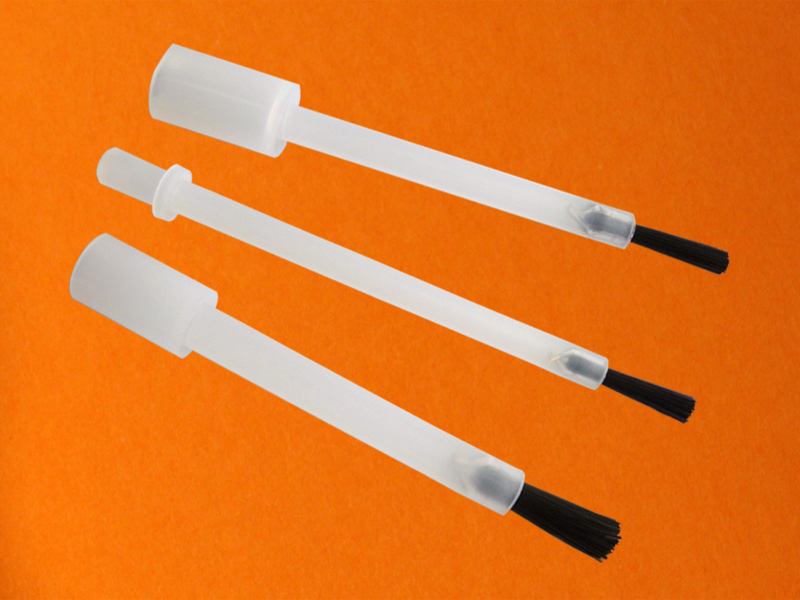 Brush with a standard fitting for pharmaceutical screw caps.